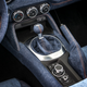 Illustration for article titled Placate Your Fears Of Global Economic Collapse With This Two-Tone Miata With A Denim Interior